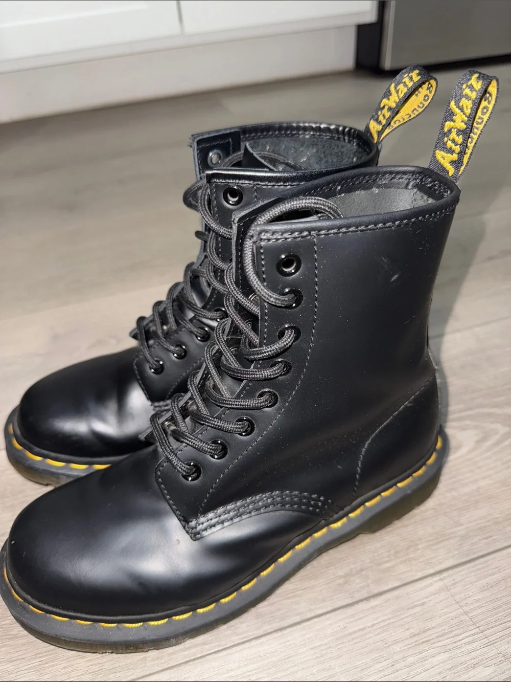 Dr. Martens Black Leather 8-Eye Lace-Up Boots with Yellow Stitching